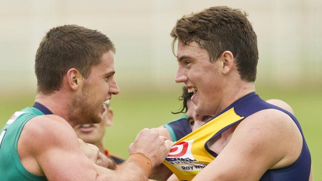 Darcy Cameron (right) has finally landed at an AFL club, after four attempts.