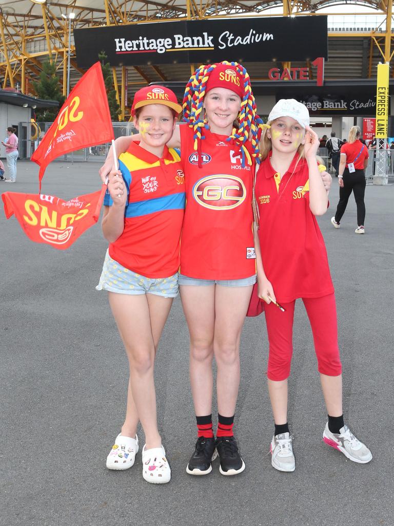 The Gold Coast Suns will host its first AFLW final when they take on the Sydney Swans on Saturday night. Lola Keating, Bella and Piper Ballantyne. 11 November 2023 Carrara Picture by Richard Gosling