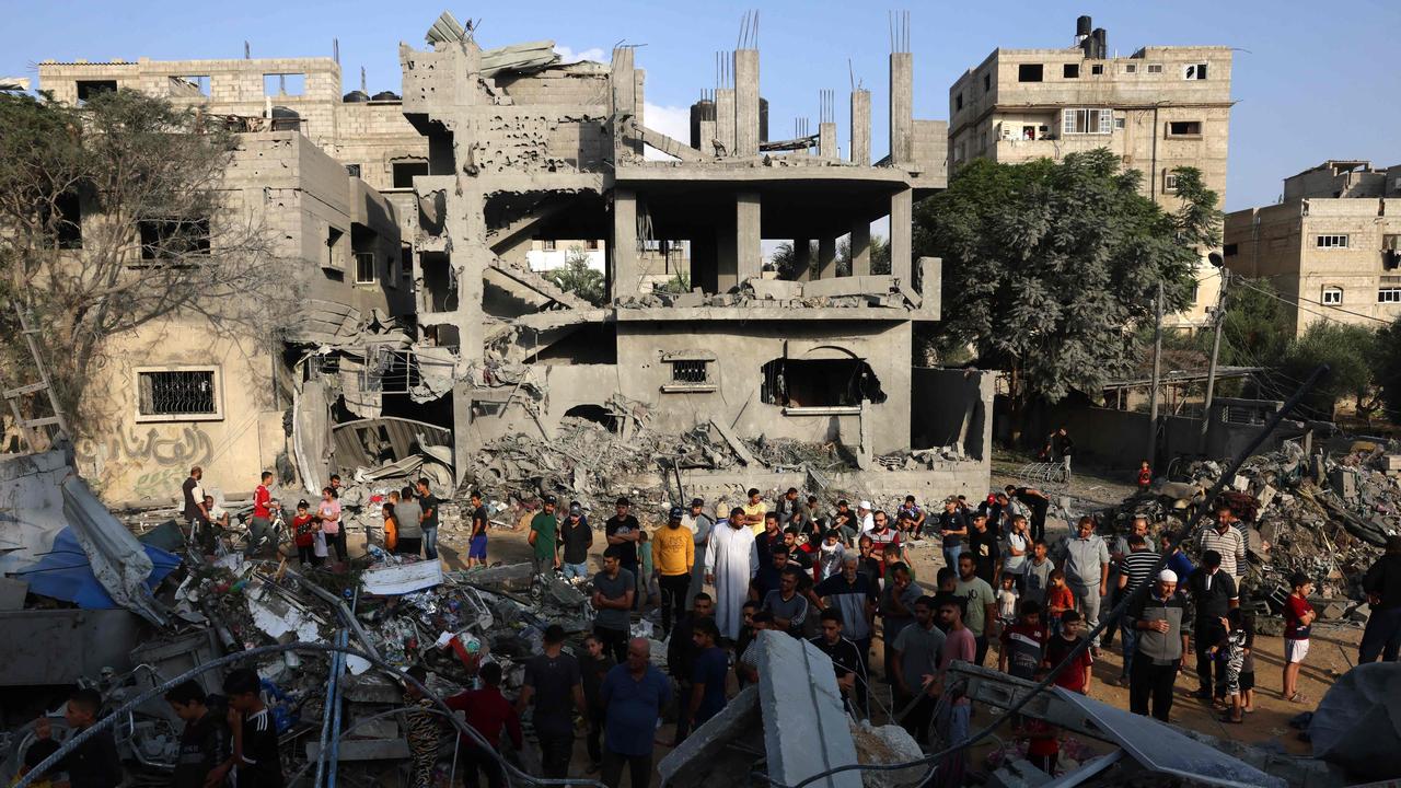 Local Palestinians inspect the damage from one of Israel’s air strikes in southern Gaza. Picture: Said Khatib