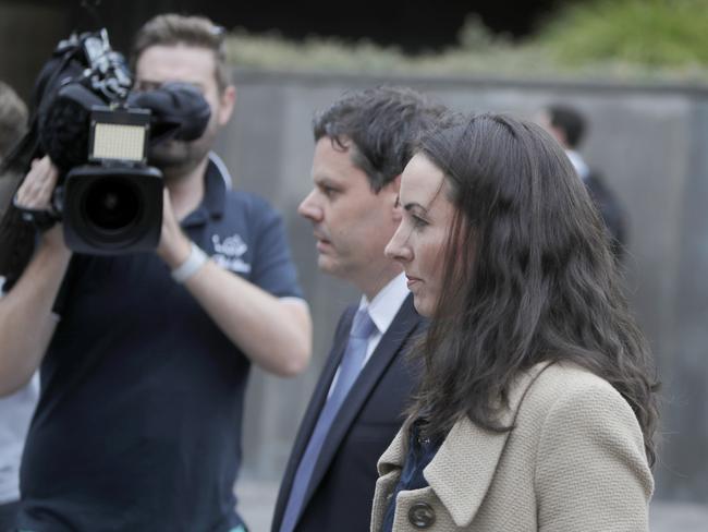 Sue Neill-Fraser's daughter Sarah Bowles and her husband Mark leave Hobart Supreme Court after her mother's bid for an appeal was approved. Picture: PATRICK GEE