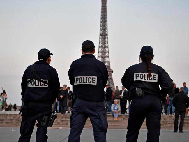 PARIS, FRANCE - APRIL 21:  Police officers secure the Place du Trocadero in front of the Eiffel Tower the day after a gunman opened fire on police officers on the Champs Elysees on April 21, 2017 in Paris, France. One police officer was killed and another wounded in a shooting on Paris's Champs Elysees, police said just days ahead of France's presidential election. France's interior ministry said the attacker was killed in the incident on the world famous boulevard that is popular with tourists. (Photo by Aurelien Meunier/Getty Images)