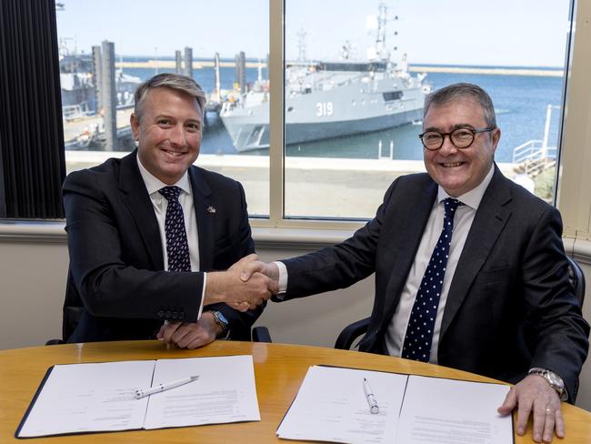 Mr Paddy Gregg, Chief Executive Officer, Austal Limited (left) and Mr Jim McDowell, Deputy Secretary, Naval Shipbuilding and Sustainment Group, sign a Heads of Agreement with the Commonwealth of Australia to establish a Strategic Shipbuilding Agreement between Austal and the Commonwealth. *** Local Caption *** The Minister for Defence Industry, the Hon. Pat Conroy MP announced a new partnership with Austal Limited that will shape the future of continuous naval shipbuilding in Western Australia on Thursday 23 November 2023. The new partnership between Defence and Austal supports the implementation of the Defence Strategic Review recommendations to accelerate and expand the delivery of Landing Craft Medium and Heavy, Austal will build the vessels at Henderson as part of the pilot program.