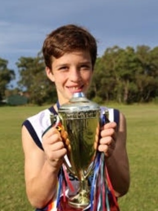 Edyn Harapin with the CIS team to its first ever win in 70 years of primary school competition.