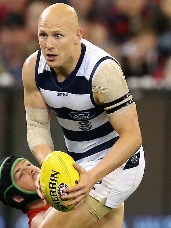 Gary Ablett tries to shrug off an Angus Brayshaw tackle. Picture: Michael Klein