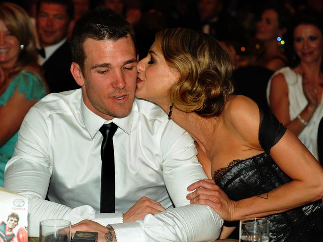 2011 Brownlow Medal. Winner Dane Swan kisses partner Taylor Wilson