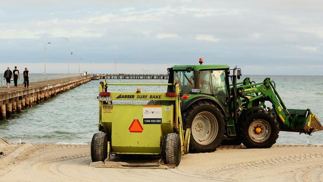 Mechanical rakes, like this one in use at Rye, will no longer be used on Mornington Peninsula beaches as the council trials hand cleaning. Picture: supplied