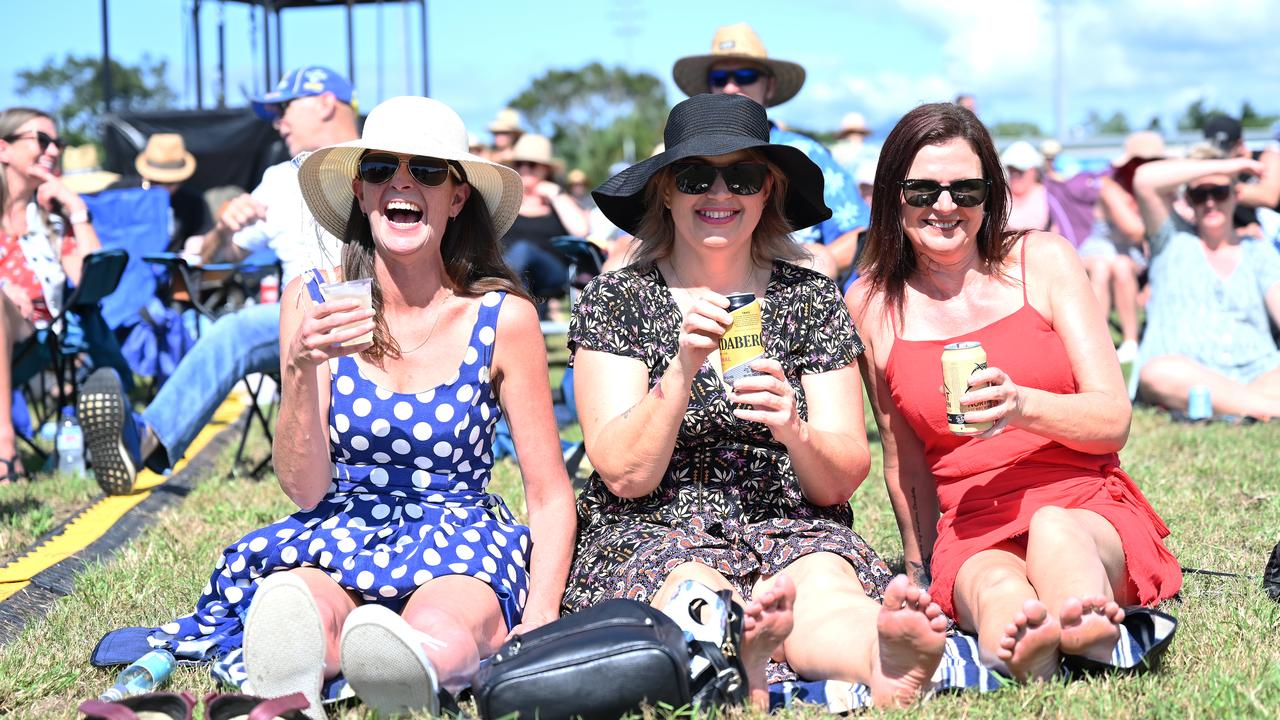 Mandy Sabni, Veria Hoyle and Simone Mcardle Kicking back on the grass at the Red Hot Summer Tour at the Cairns Showgrounds on Saturday afternoon. Picture Emily Barker