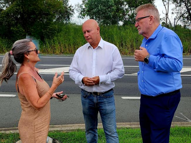 Coomera MP Michael Crandon and Shadow Transport Minister Steve Minnikin MP speaking with residents at Norfolk Village.