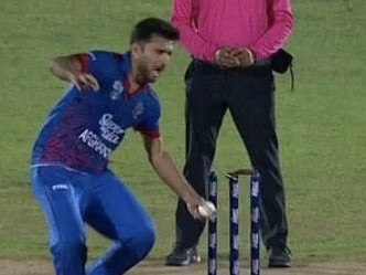 Afghanistan's Fazalhaq Farooqi runs out Pakistan's Shadab Khan at the non-striker's end in the 2nd ODI.