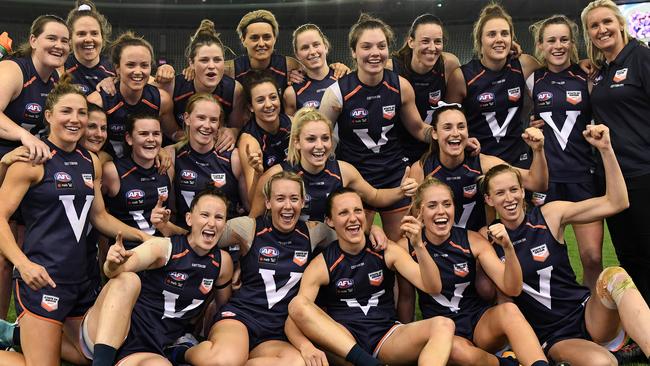 Victorian players celebrate winning the AFLW State of Origin match. Picture: AAP Images