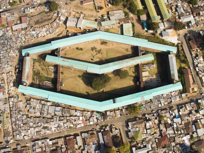 Unequal Scenes: Segregation of urban spaces in South Africa. Picture: Johnny Miller/Millefoto/Rex Shutterstock/Australscope