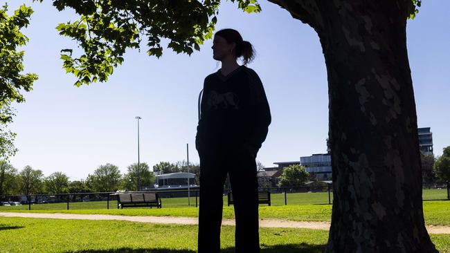 Senior Constable Elissa Dykstra from Yarra Crime Investigation Unit and the victim Poppy at Richmond Police station after Poppy was attached and punched by a man. Pictures need to be Non identifying of Poppy.Picture by Wayne Taylor 9th October 2024