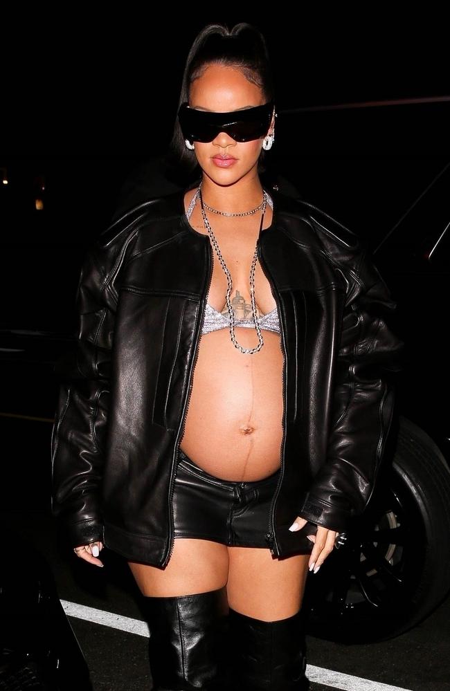 Rihanna's bump-baring outfits show progress in the slow world of