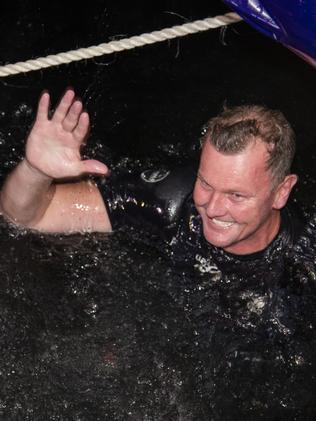 Bell after being thrown overboard to celebrate taking line honours in 2016. Picture: AAP