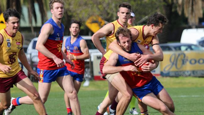 Andrew Sturgess is taken high in a tackle while playing for Seymour. Picture: Aaron Cook