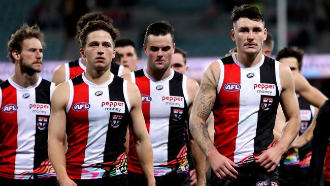 Dejected Saints players leave the field after being well beaten on the road in Sydney. Picture: Brendon Thorne/AFL Photos/via Getty Images