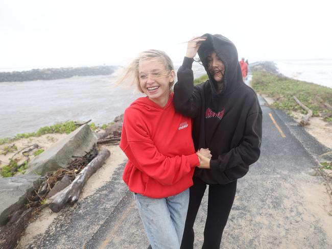 Grace Mulholland and Sanji Clarkso battling strong winds at the Brunswick Heads. Picture: Rohan Kelly