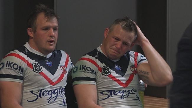 Josh Morris consoles his brother Brett after he picked up a career-ending injury.