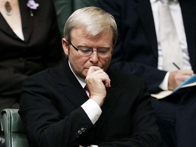 (FILES) Australian Prime Minister Kevin Rudd prepares to deliver an apology to the Aboriginal people for injustices committed over two centuries of white settlement at the Australian Parliament on February 13, 2008 in Canberra.  Rudd faced protests on March 12, 2008, as he led parliament in congratulating Israel on the upcoming 60th anniversary of its statehood.    AFP PHOTO