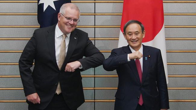 Scott Morrison and Yoshihide Suga. Picture: AFP