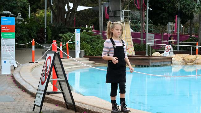 Summer Rose, 10 of Buderim, stands next to the roped off Boat pool at South Bank. Photographer: Liam Kidston.