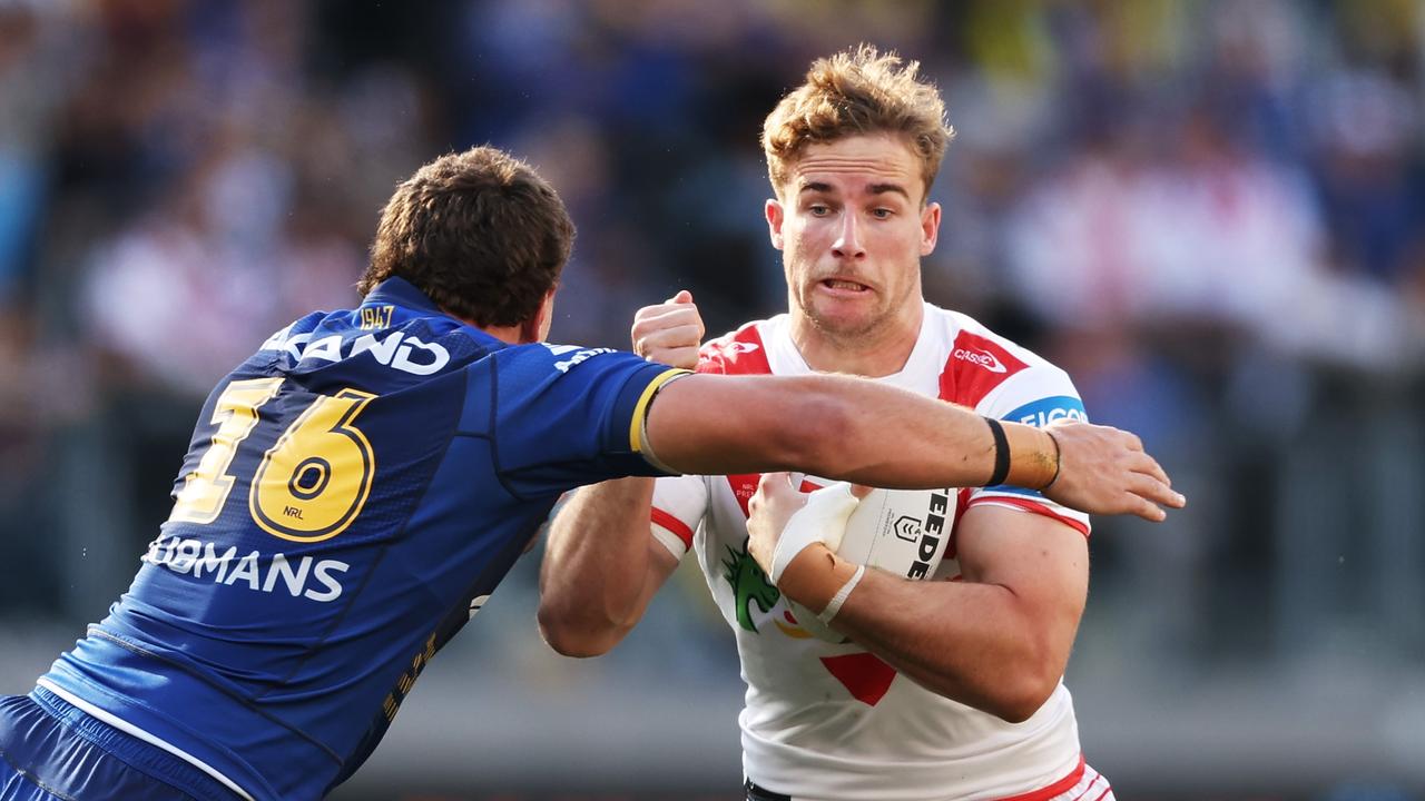 SYDNEY, AUSTRALIA - AUGUST 31: Ryan Couchman of the Dragons is tackled during the round 26 NRL match between Parramatta Eels and St George Illawarra Dragons at CommBank Stadium, on August 31, 2024, in Sydney, Australia. (Photo by Matt King/Getty Images)