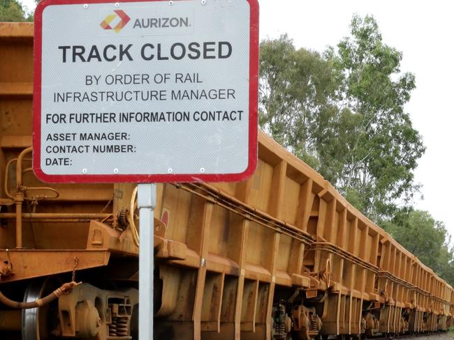 Track Closed, empty train sits idle on tracks leading to Clive Palmer's Queensland Nickel refinery, Townsville. Photographer: Liam Kidston.