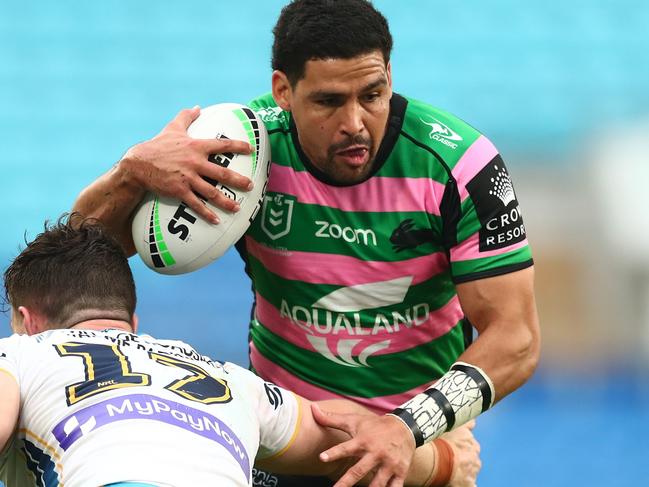 GOLD COAST, AUSTRALIA - AUGUST 14: Cody Walker of the Rabbitohs is tackled during the round 22 NRL match between the South Sydney Rabbitohs and the Gold Coast Titans at Cbus Super Stadium, on August 14, 2021, in Gold Coast, Australia. (Photo by Chris Hyde/Getty Images)