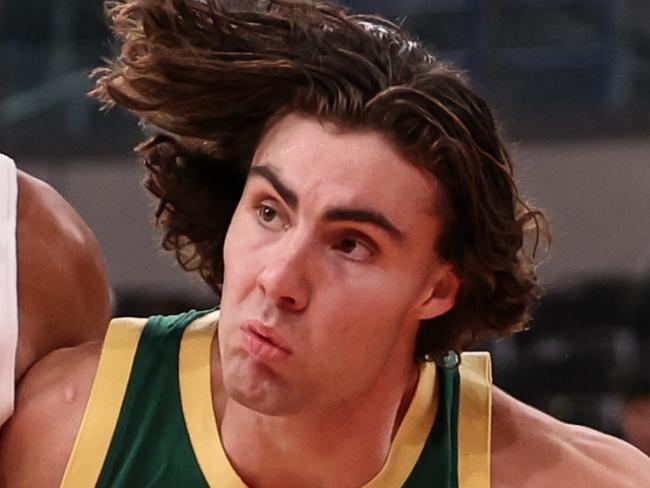 TOKYO, JAPAN - AUGUST 20: Josh Giddey #3 of Australia drives against Nicolas Batum #5 of France during the international basketball game between France and Australia at Ariake Arena on August 20, 2023 in Tokyo, Japan. (Photo by Takashi Aoyama/Getty Images)