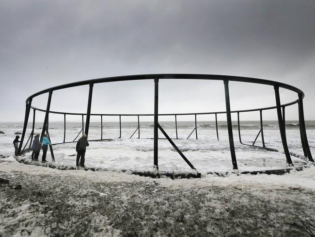 A salmon farm pen washed up in Taroona during the recent wild weather. Picture: MATHEW FARRELL