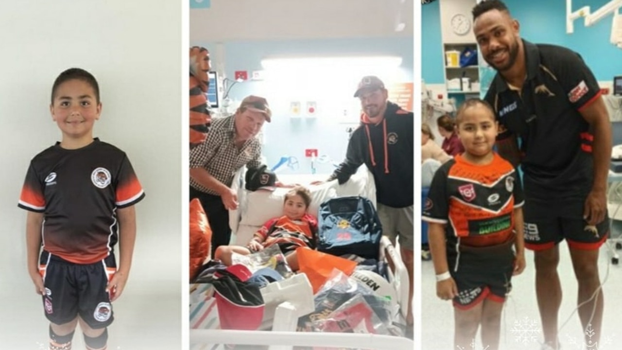 Southern Suburbs Tigers juniors are mourning the passing of Jaxon Gilmartin who lost a year long battle with a brain tumour recently. Jaxon’s favourite player Hamiso Tabuai-Fidow (pictured right) visited him during his stay in hospital.