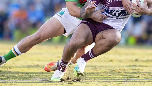 The turf was ripped up by players throughout the game. Picture: AAP