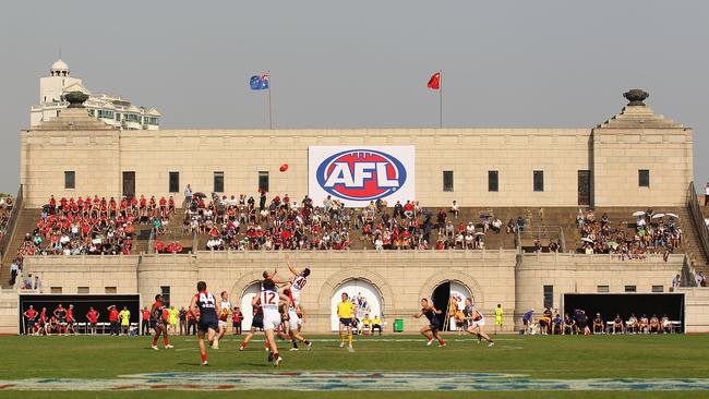 SHANGHAI, CHINA — OCTOBER 17: A general view of the opening bounce during the AFL Kaspersky Cup Shanghai Showdown match between the Brisbane Lions and the Melbourne Demons at Jiangwan Sports Centre on October 17, 2010 in Shanghai, China. (Photo by Ryan Pierse/Getty Images)