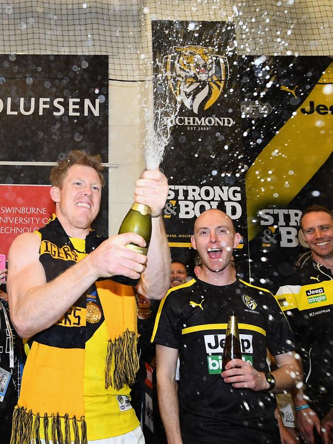 Riewoldt of the Tigers pops some champagne