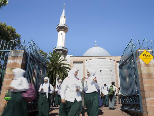 NO BYLINE - General photographs of students leaving Malek Fahd Islamic School on Waterloo Road in Greenacre NSW Australia - Government is discussing whether to remove funding from the school or not after funds have been misused.