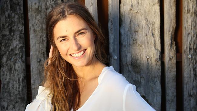 Frances Abbott. She is modeling a white shirt for White Shirt Campaign for the Ovarian Cancer Research Foundation (OCRF).