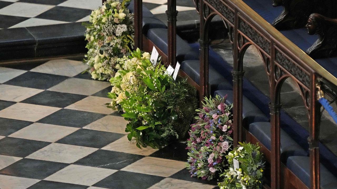 Wreaths from members of the Royal family during the funeral service of Britain's Prince Philip. Meghan and Harry’s is second from right. Picture: AFP