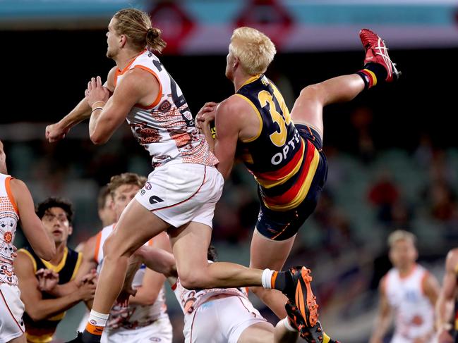 The Himmelberg brothers could come up against each other again this weekend at Adelaide Oval. Picture: James Elsby/AFL Photos via Getty Images