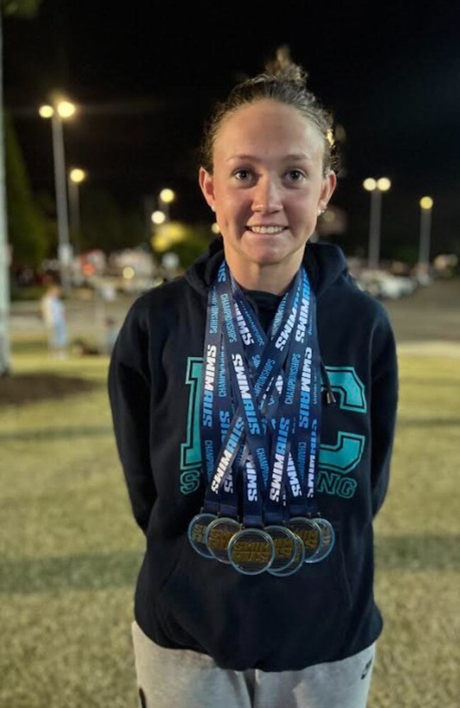 Rockhampton swimmer Taryn Roberts with another of her impressive medal hauls.