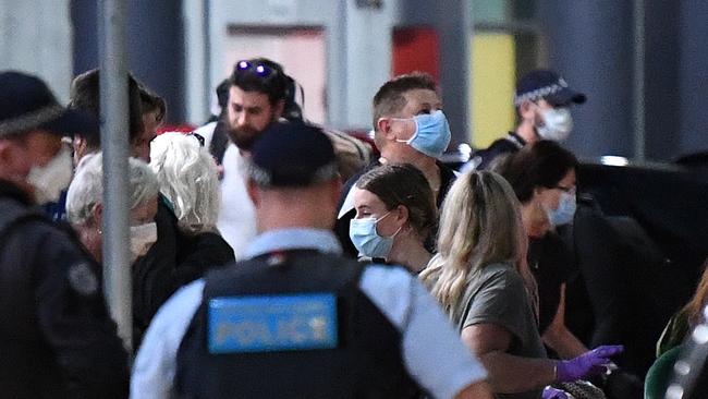 Overseas travellers arriving in Brisbane yesterday ahead of their enforced 14-day quarantine. New cases across Queensland have slowed, but there has been a 16% increase in Toowoomba and across the Darling Downs in recent days. Picture: Dan Peled