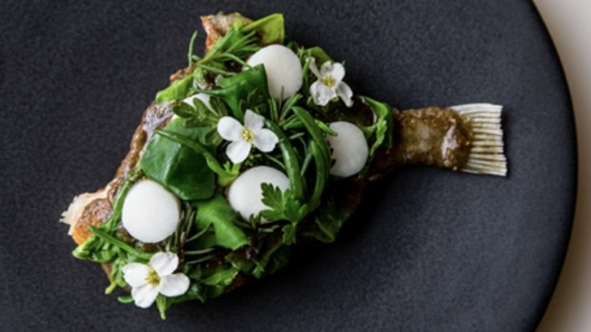 Roasted John Dory served on the bone, white turnips, umami butter, native coastal greens (sea parsley, Coorong sea blite, barilla and karkalla) at Bennelong restaurant.