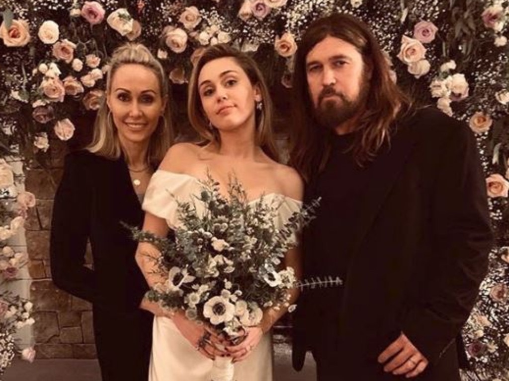 Miley with her dad Billy Ray and her mother Tish. Picture: Instagram/Billy Ray Cyrus