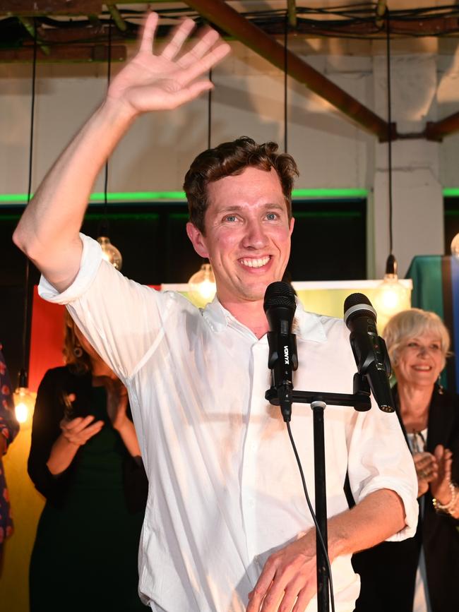 The Greens' Max Chandler-Mather celebrates winning the Queensland seat of Griffith. Picture: Getty Images