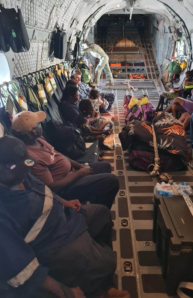 Residents from the Kalkarindji area on-board a Royal Australian Air Force C-27J Spartan as they are evacuated during major flooding in the Northern Territory.