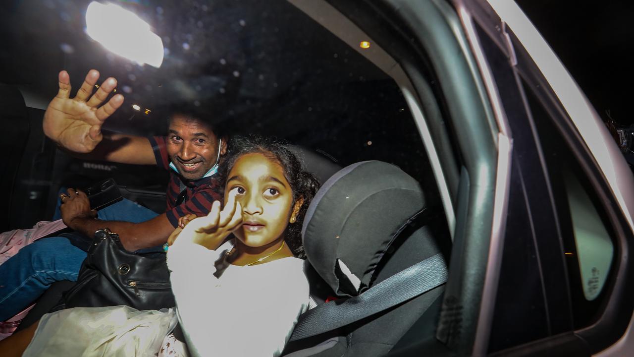 Nadesalingam Murugappan and daughter Kopika (6) arrive from Christmas Island during their detention.