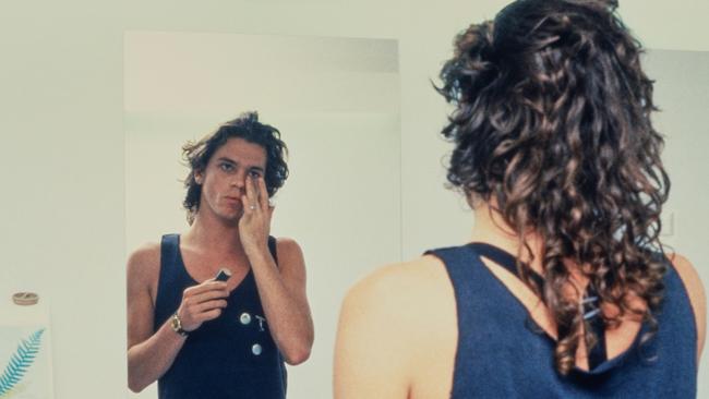 A never-seen-before photo of Michael Hutchence getting ready for a gig around Listen Like Thieves period. Picture: Supplied.