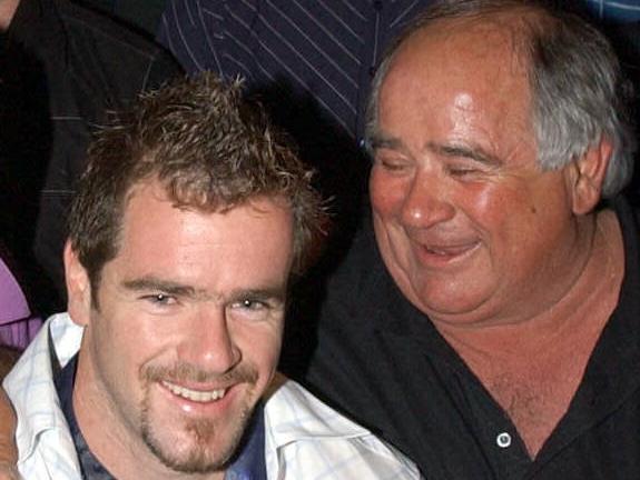 Footballer Mark Ricciuto wearing Brownlow Medal with parents Carolyn and Murray at Alma Tavern, Norwood 23 Sep 2003. winner