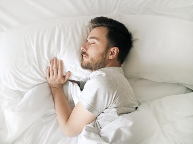 Lifestyle portrait of sleeping man