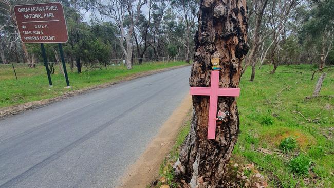 A memorial honouring the life of a 56-year-old woman has been removed from Piggott Range Rd. Picture: Supplied