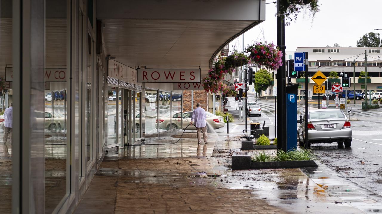 Rowes staff clean up after flood water again went through the Russell St business, Saturday, February 26, 2022. Picture: Kevin Farmer